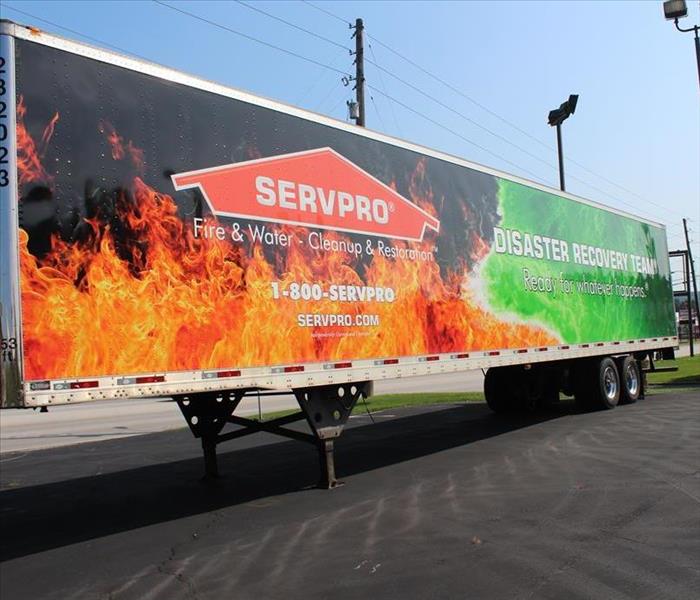image of SERVPRO® storm trailer parked in parking lot awaiting a storm call