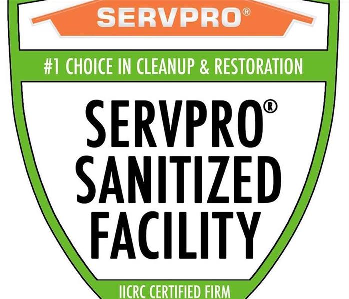 image of window cling, showing the public that a property has been sanitized by SERVPRO®