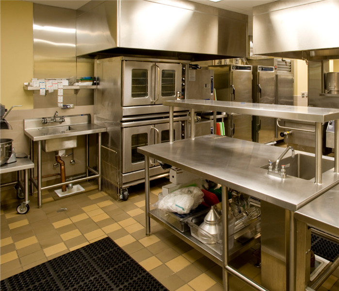 commercial kitchen with tile flooring